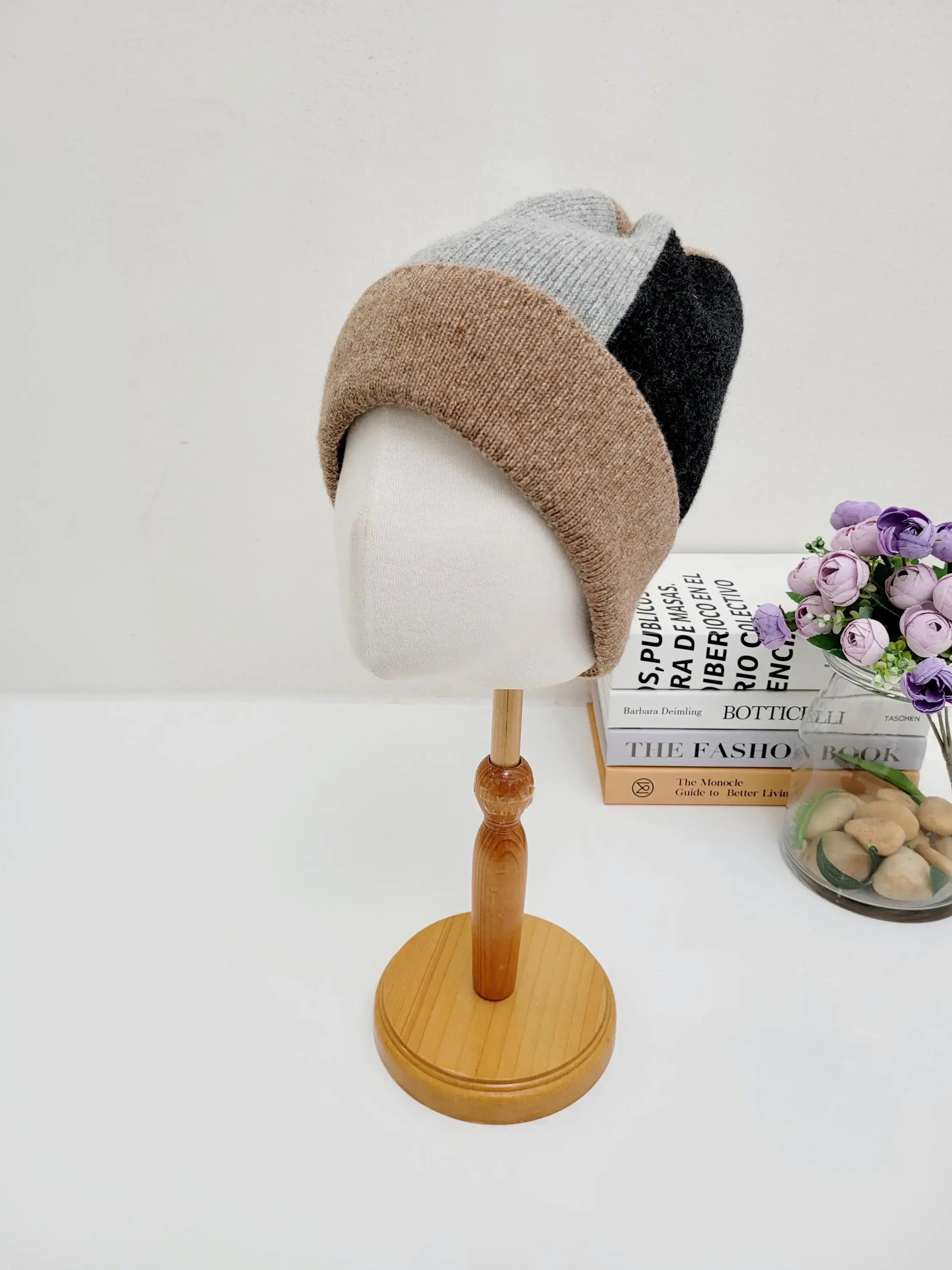 Tri-color color block wool beanie on a mannequin head. The beanie features brown, gray, and black sections.