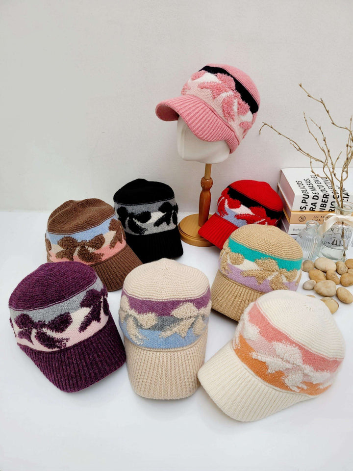 EARMUFF knitted wool cap collection: assorted colors, patterned brims, cozy warmth for winter style.