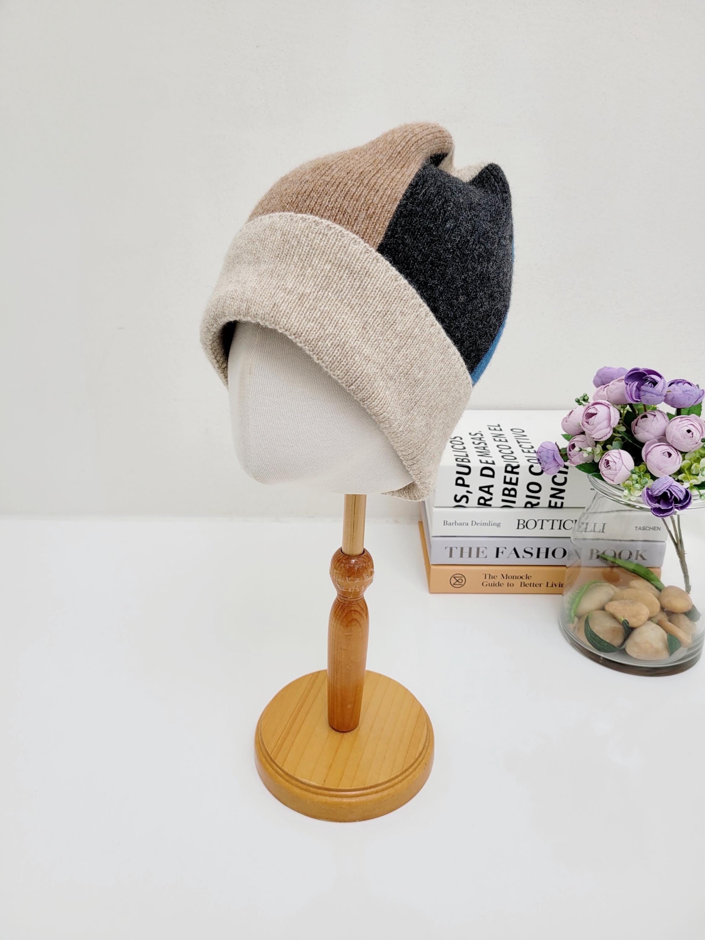 color block wool beanie featuring beige, brown, and charcoal hues. A stylish and warm headwear choice.
